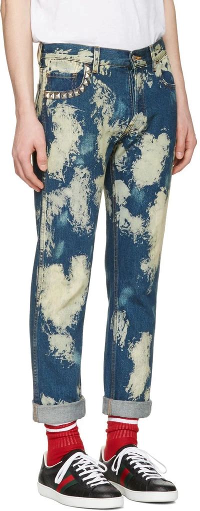 gucci bleached denim and punk|Tapered denim pant in blue .